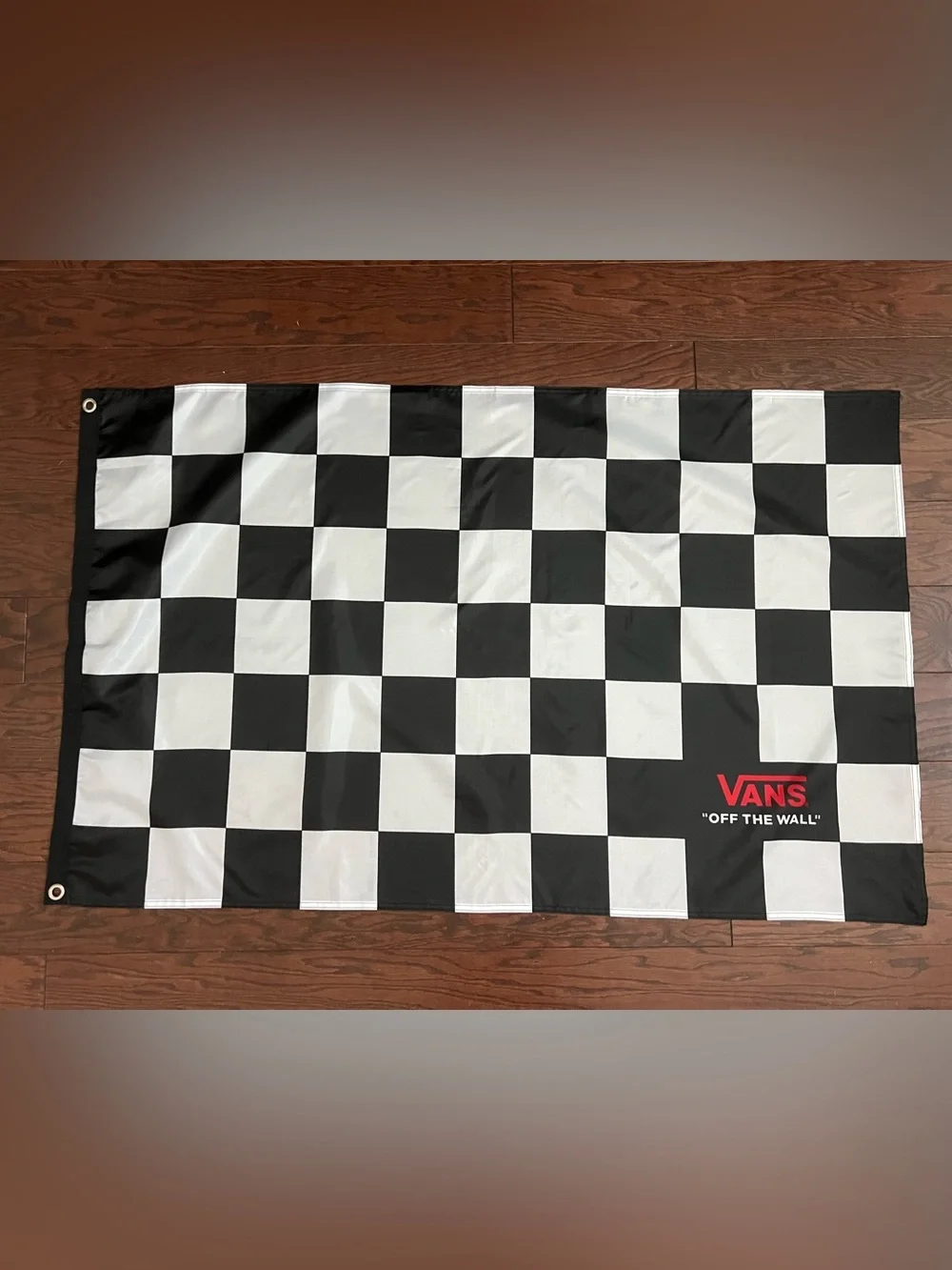 Vans Black and White Checkerboard Banner with Red Accent